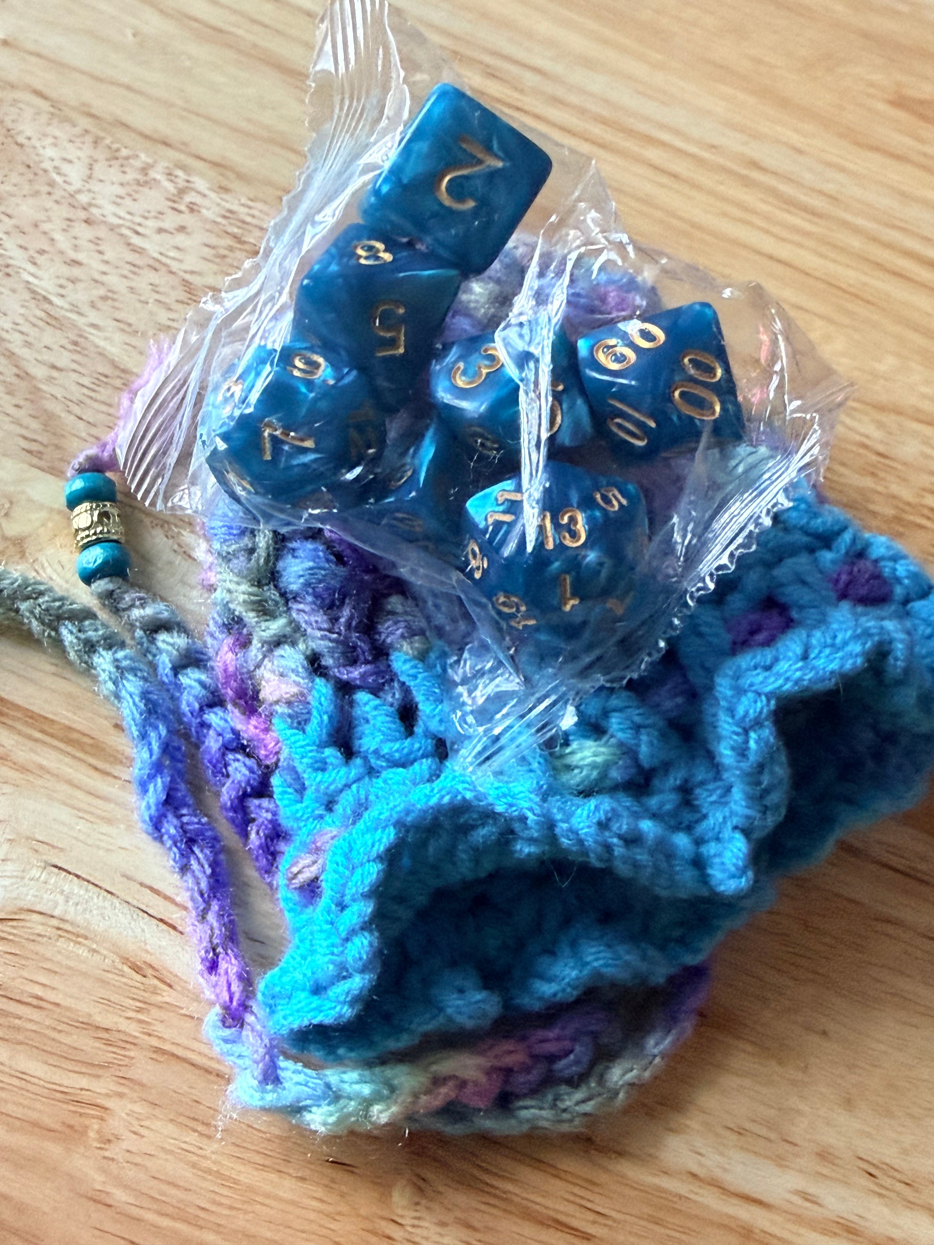 cool pastel colors and teal dice bag