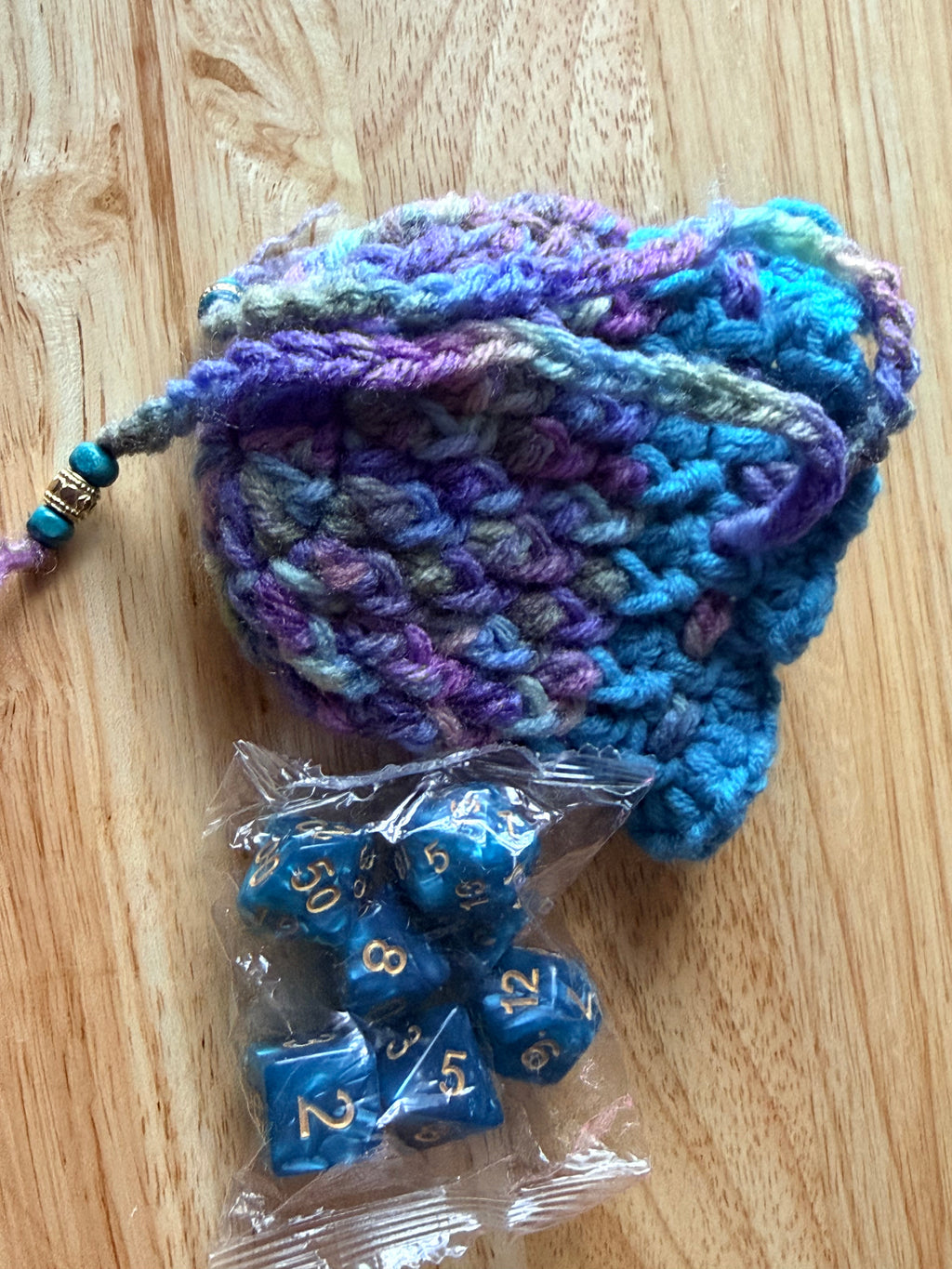 cool pastel colors and teal dice bag
