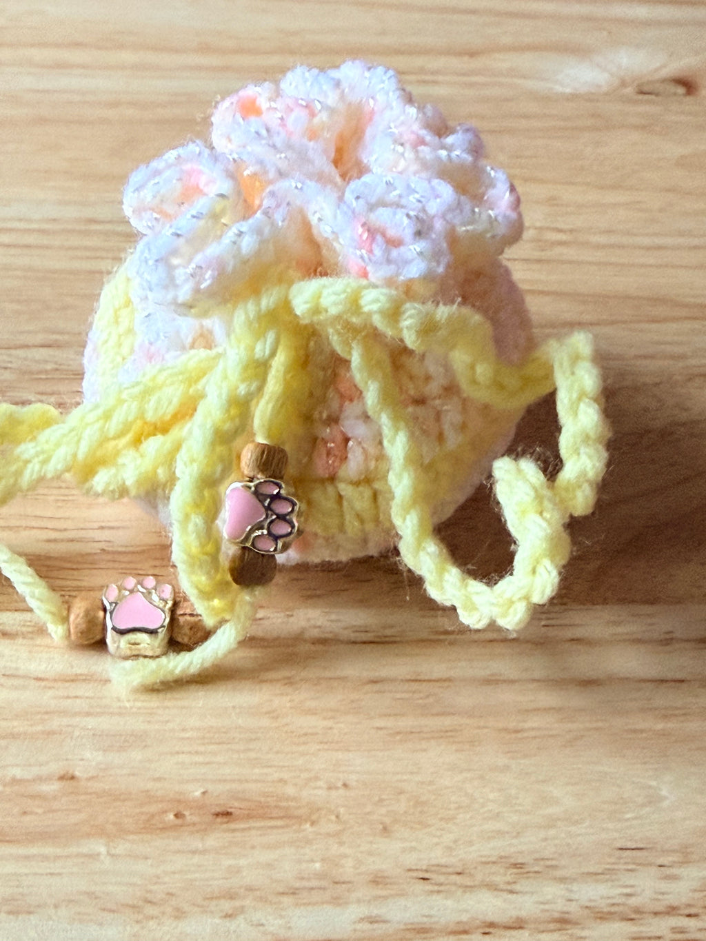 peach and yellow dice bag