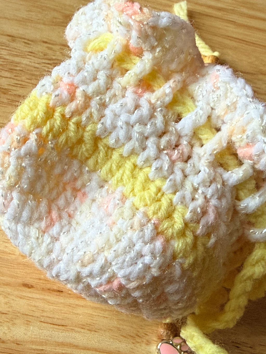 peach and yellow dice bag