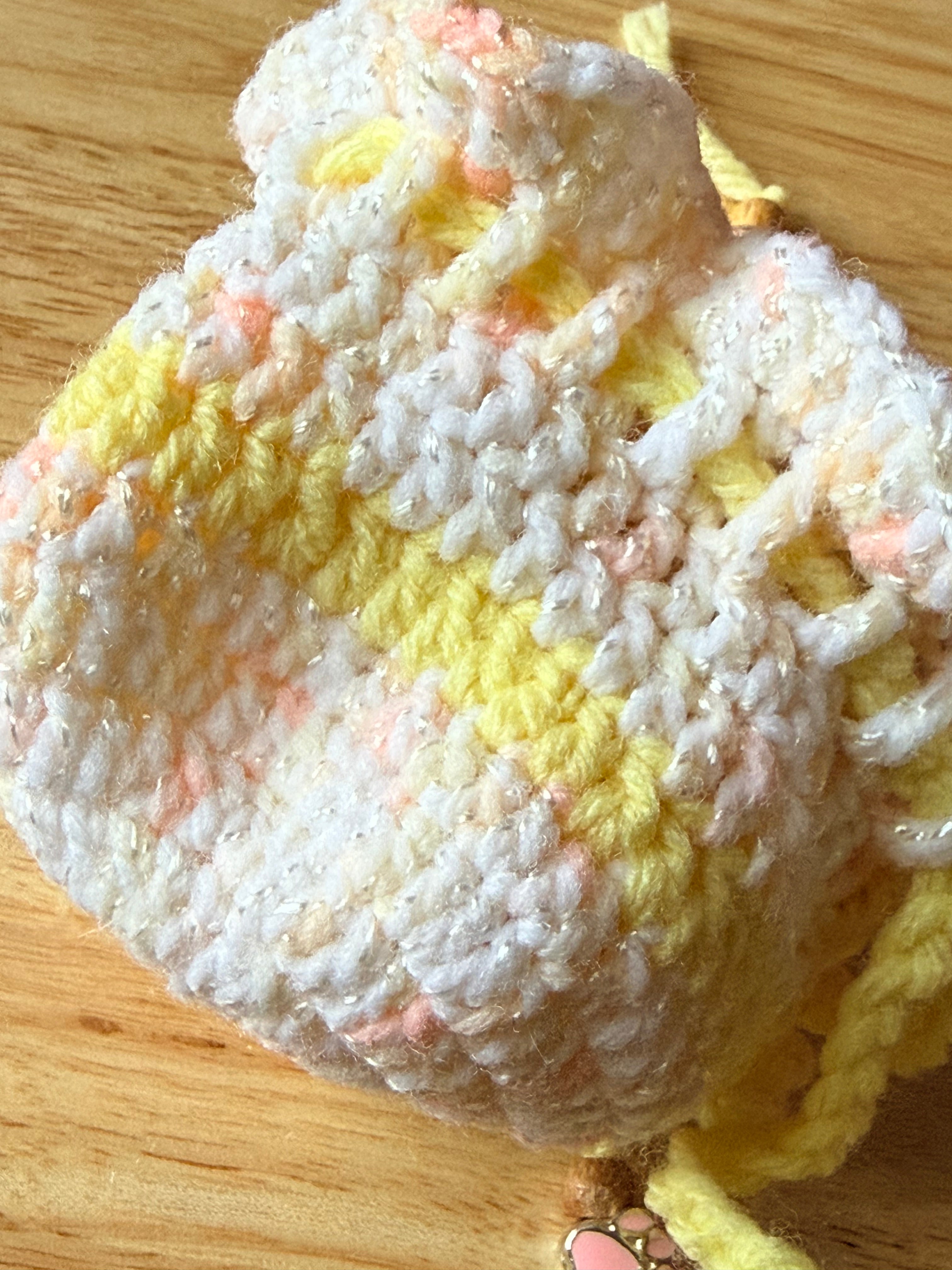 peach and yellow dice bag