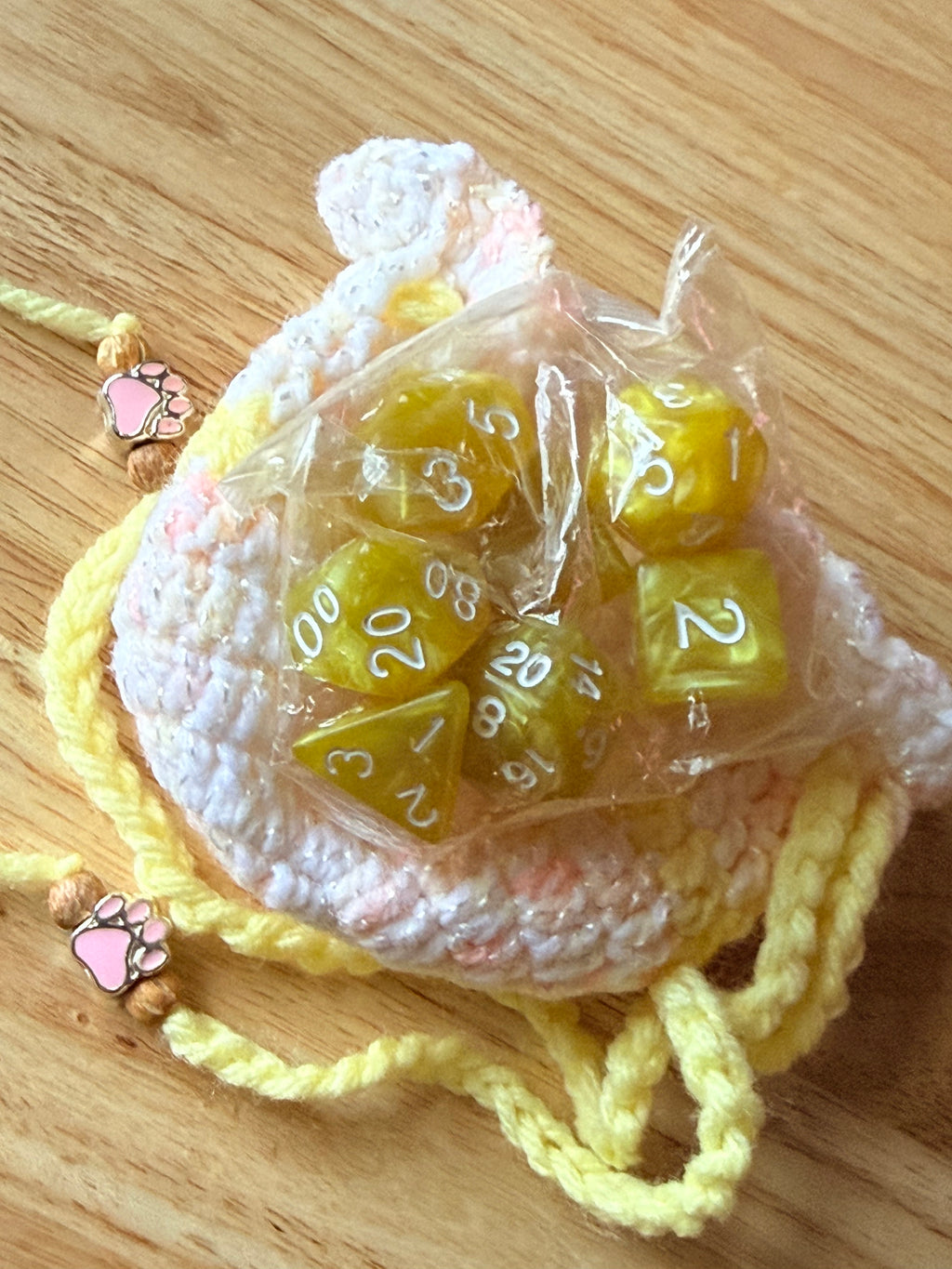 peach and yellow dice bag